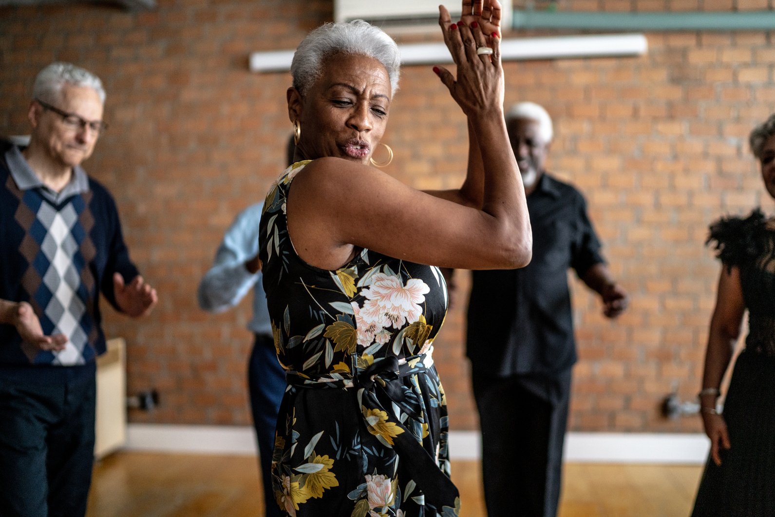 Senior woman dancing on a dance hall