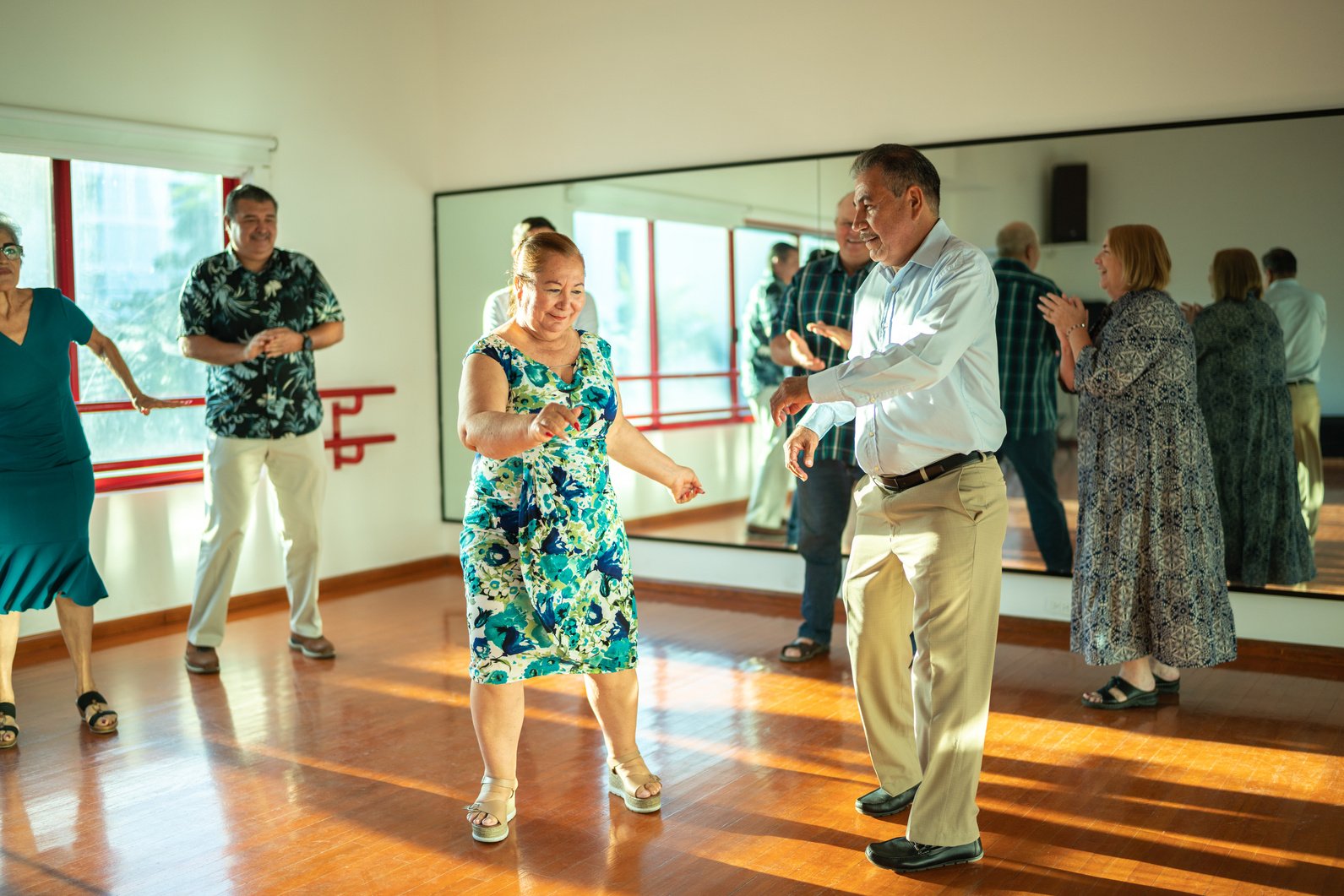 Mature couple dancing at a dance studio